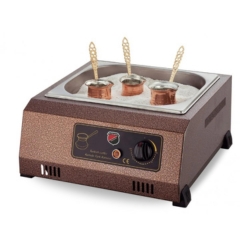 ماكينة قهوة على الرمال